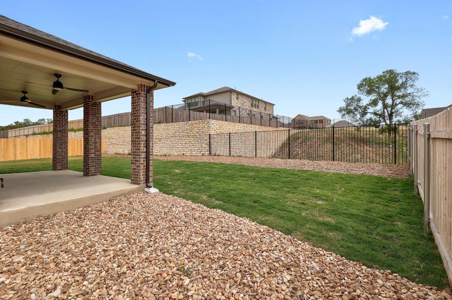 Exterior details and patio area of a home in River Bluff, Leander (Image 20).