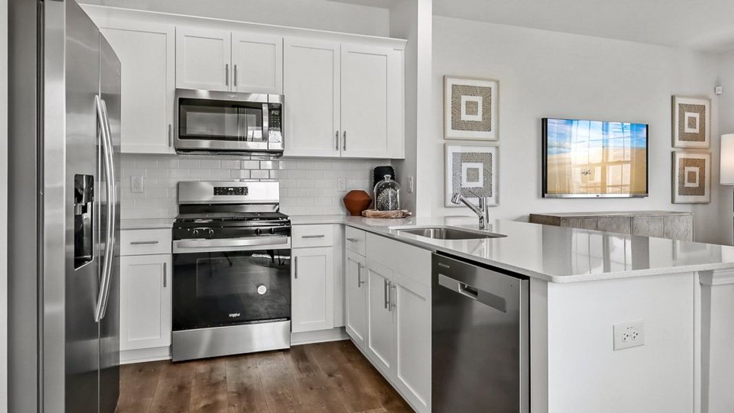 Furnished interior view inside a new home in The Townes at Prestleigh, Wake Forest (Image 7). Furnished interior view inside a new home in The Townes at Prestleigh, Wake Forest (Image 7).
