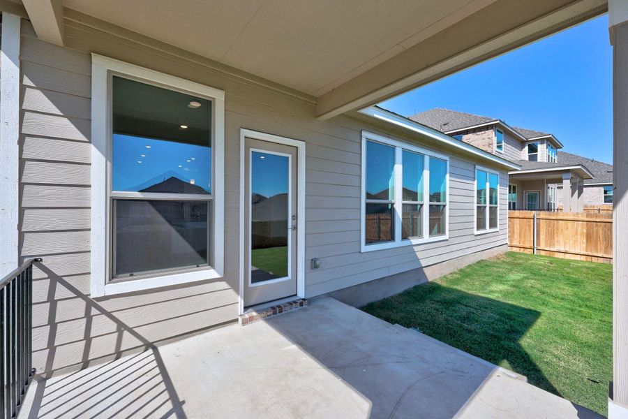 Exterior details and patio area of a home in Salerno - Classic Collection, Round Rock (Image 19).