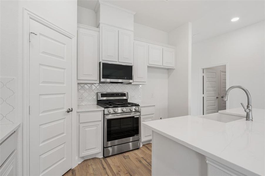 Furnished interior view inside a new home in Stone River Glen, Royse City (Image 9).