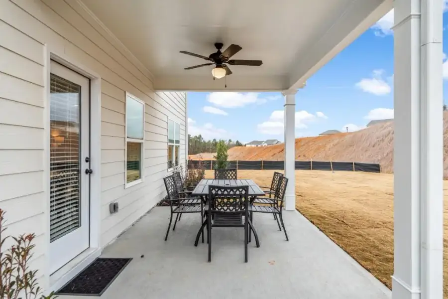 Exterior details and patio area of a home in Saddle Ridge, Calhoun (Image 22).