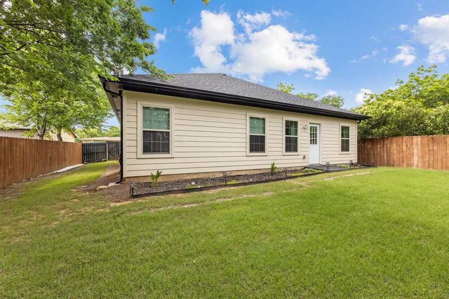 Exterior details and patio area of a home in , Fort Worth (Image 23).