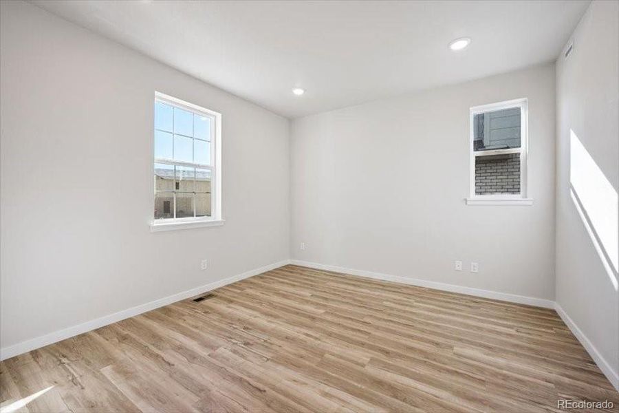 Spacious, unfurnished interior of a new home in The Boulevard II Collection at Windler, Aurora (Image 9).