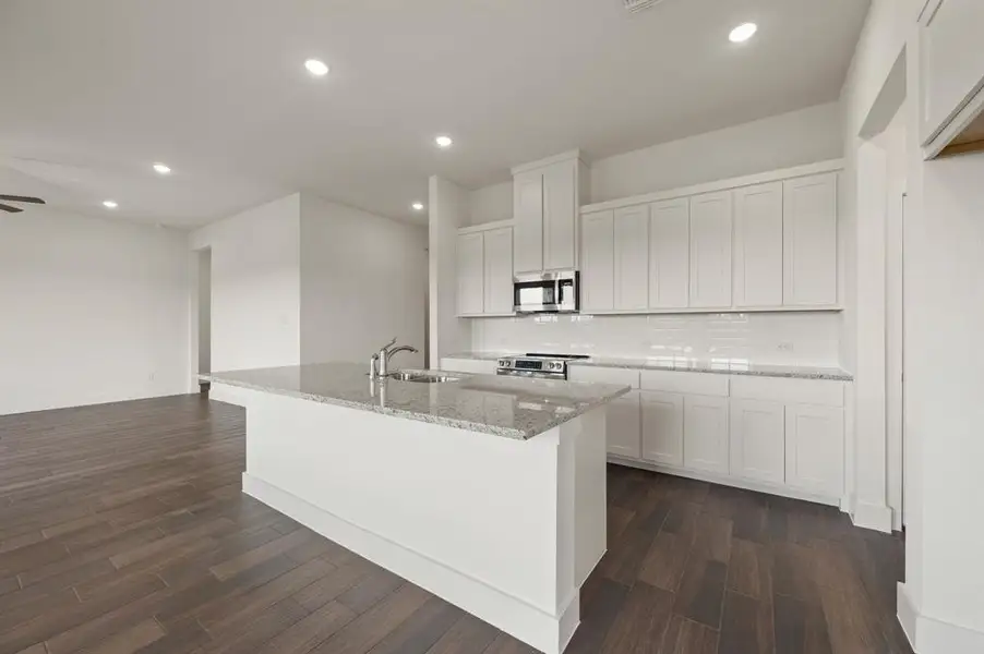 Furnished interior view inside a new home in Saddleback Estates, Boyd (Image 6). Furnished interior view inside a new home in Saddleback Estates, Boyd (Image 6).
