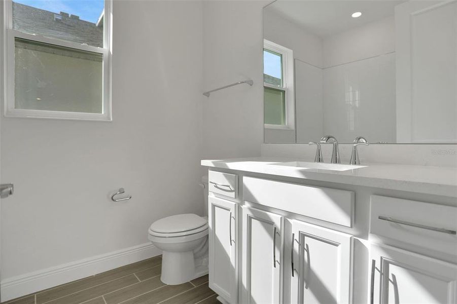 Furnished interior view inside a new home in Seaire, Parrish (Image 9).