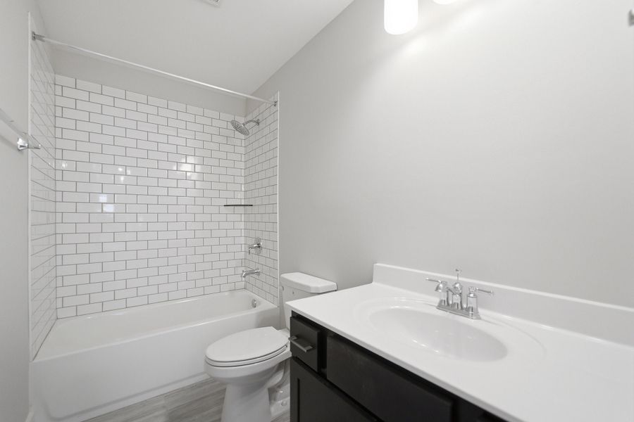 Furnished interior view inside a new home in Aden Woods, Fairview (Image 13).
