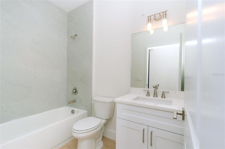 Guest Bathroom with elegant Moen fixtures