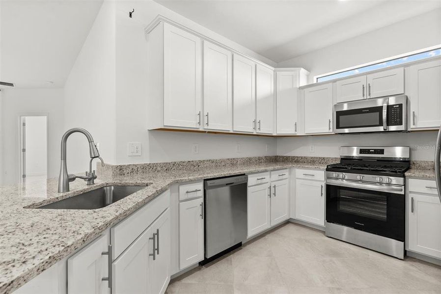 Furnished interior view inside a new home in Lorraine Lakes at Lakewood Ranch, Lakewood Ranch (Image 7).