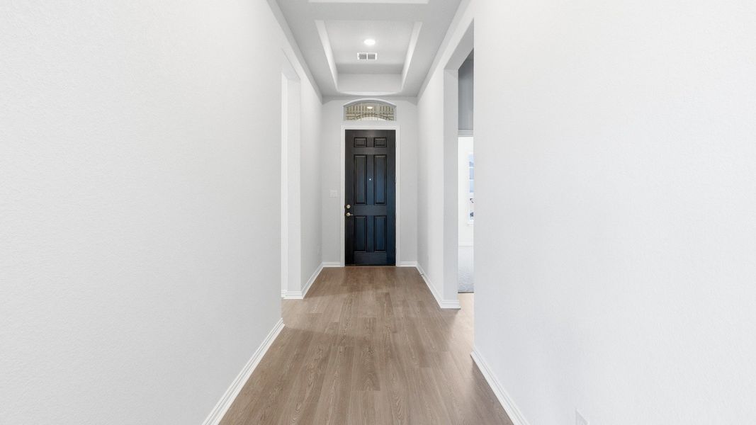 Furnished interior view inside a new home in Carillon, Manor (Image 11).
