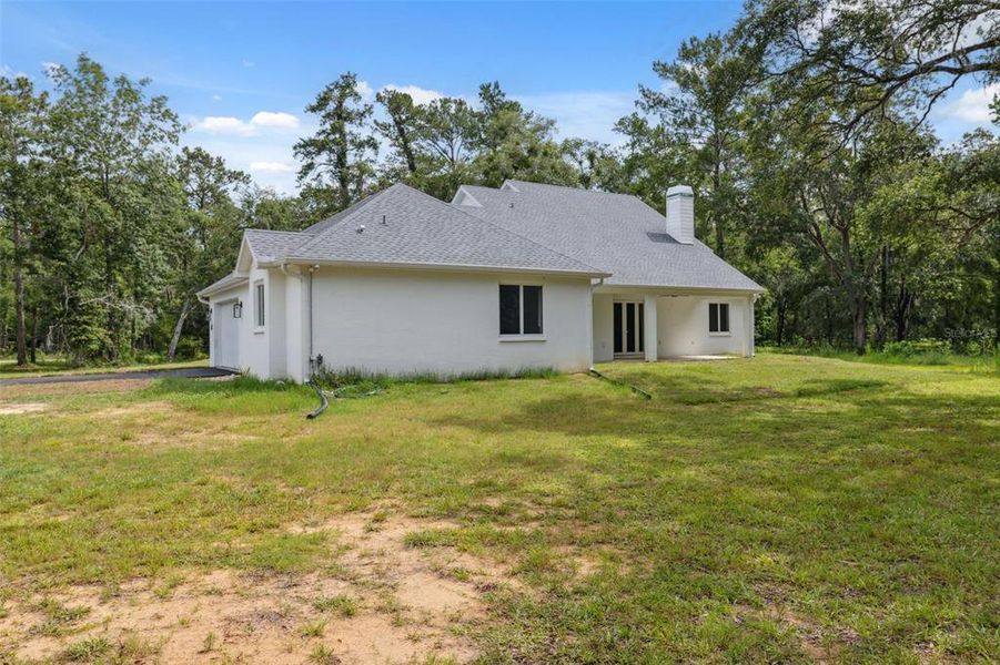 Exterior details and patio area of a home in , Brooksville (Image 28).