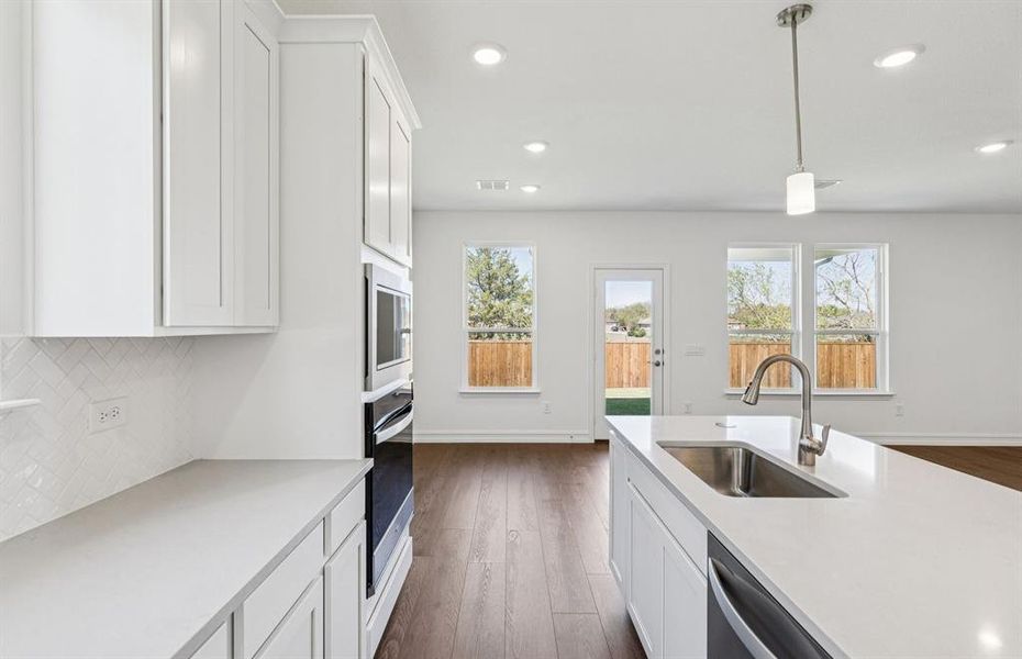 Airy kitchen with ample cabinet space Airy kitchen with ample cabinet space