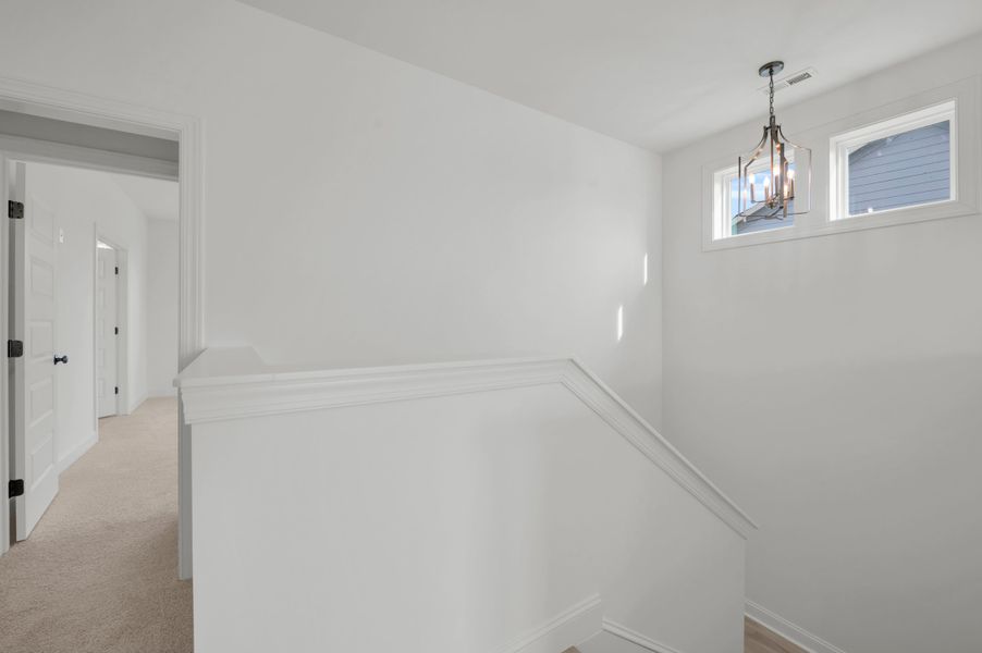 Representative unfurnished interior of a home built from the The Hampton by RobuckHomes in Windwater, Hampstead (Image 52).