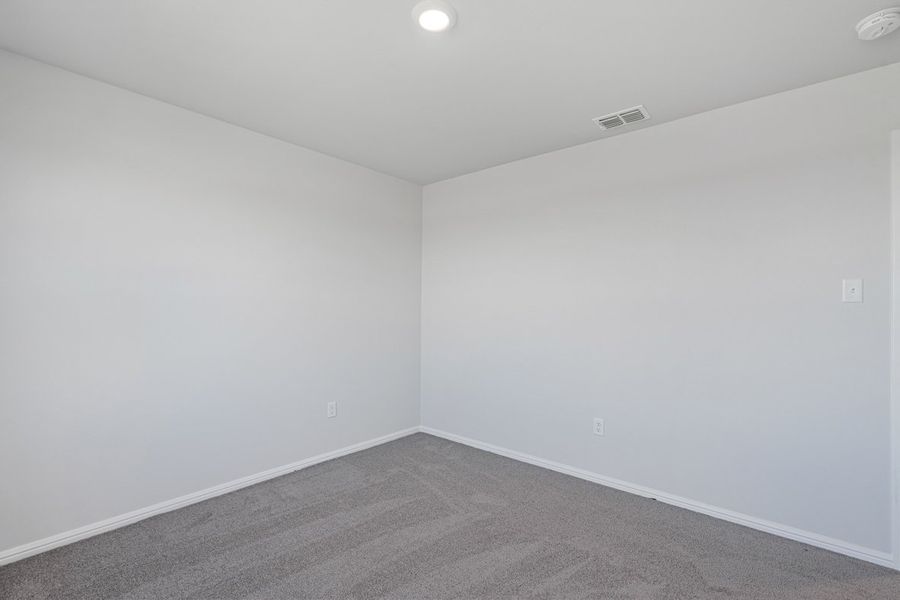 Representative unfurnished interior of a home built from the TEXAS CALI by D.R. Horton in Faculty Row, Abilene (Image 52).