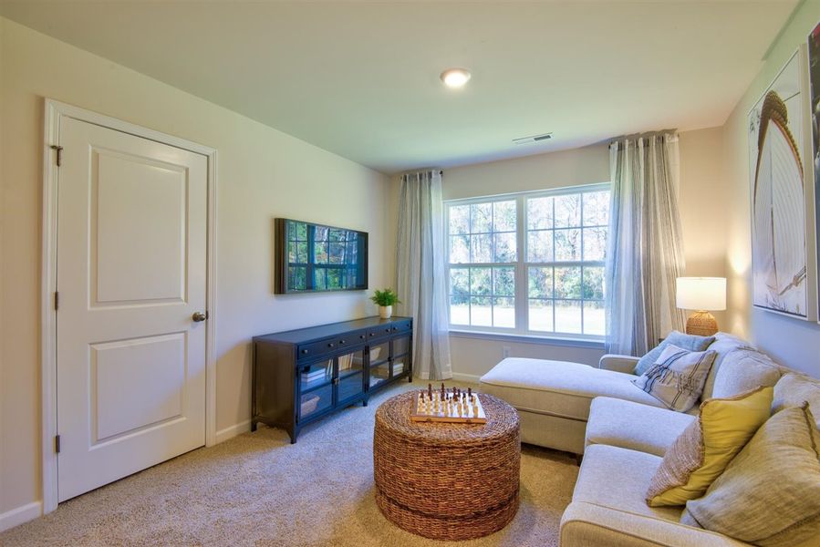 Representative furnished interior of a home built from the HAYDEN by D.R. Horton in Raven Ridge, Lexington (Image 35).