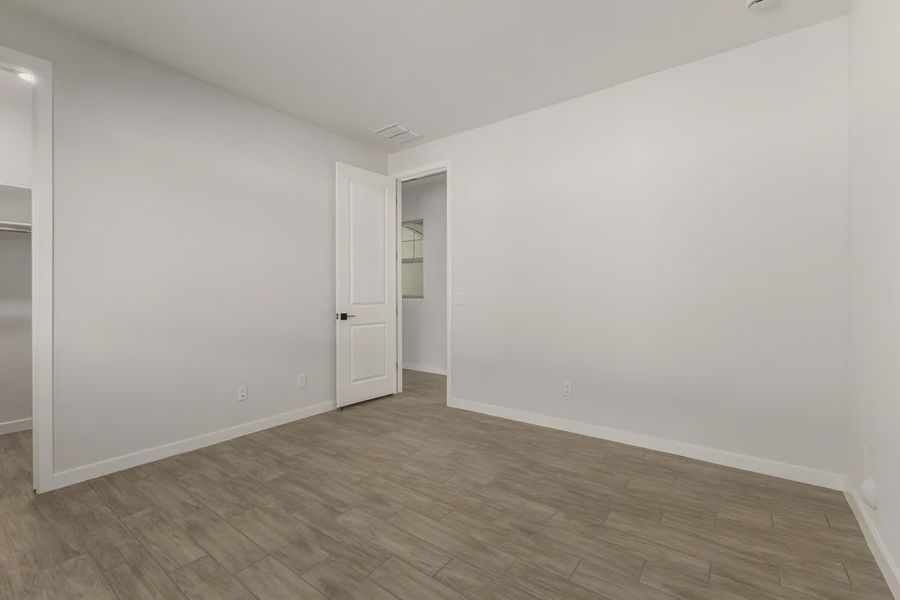 Spacious, unfurnished interior of a new home in Forté at Granite Vista, Waddell (Image 38).