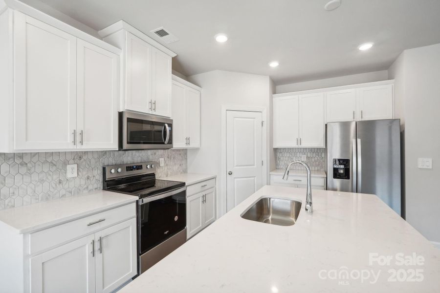 Furnished interior view inside a new home in Harper Landing, Stanley (Image 13).