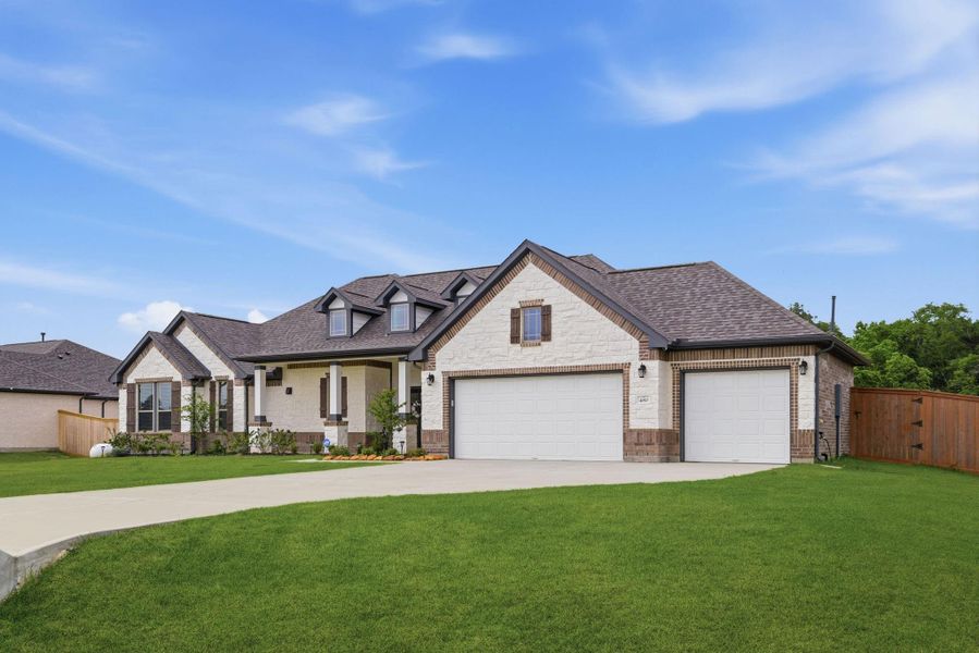 Front exterior of a new home in , Cleveland, TX, highlighting curb appeal (Image 23).
