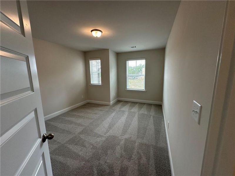 Spacious, unfurnished interior of a new home in Mulberry Summit, Flowery Branch (Image 13).