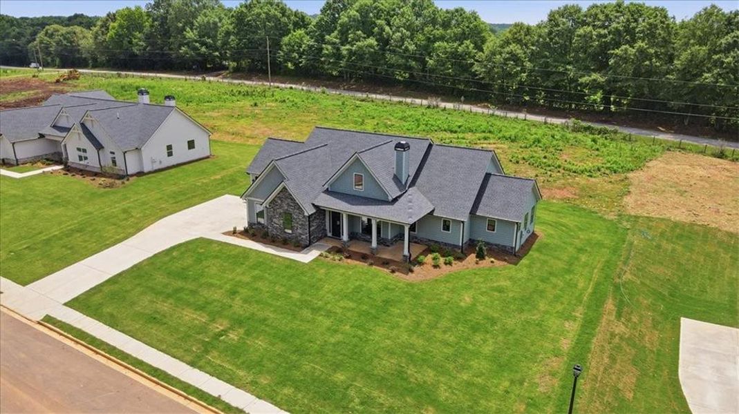 Front exterior of a new home in , Statham, GA, highlighting curb appeal (Image 2). Front exterior of a new home in , Statham, GA, highlighting curb appeal (Image 2).