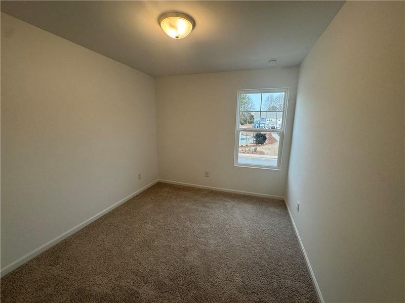 Spacious, unfurnished interior of a new home in Laurelwood, Douglasville (Image 11).