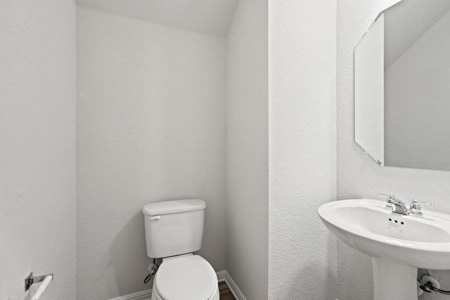 Photos are of a completed model of the same floor plan and are for illustrative purposes only. Actual home is under construction and design selections, materials, and features may differ. Confirm final specifications with the New Home Consultant.