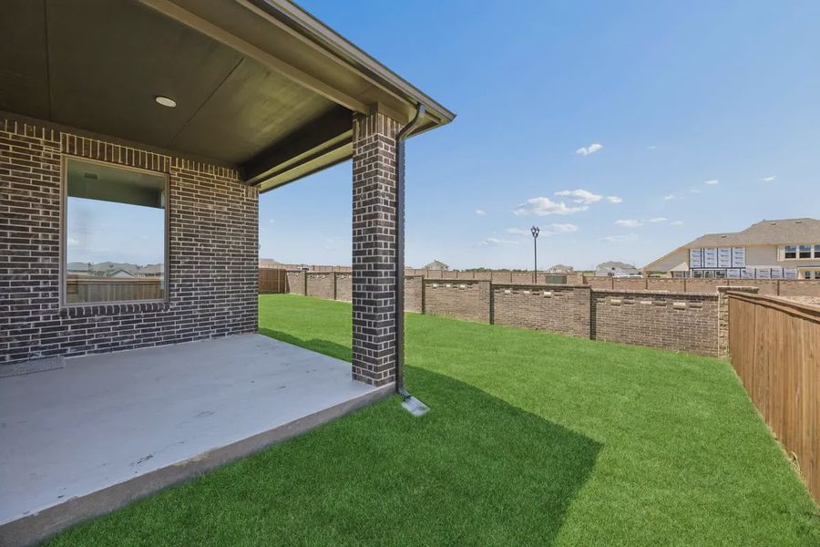 Exterior details and patio area of a home in Silo Mills, Joshua (Image 22).