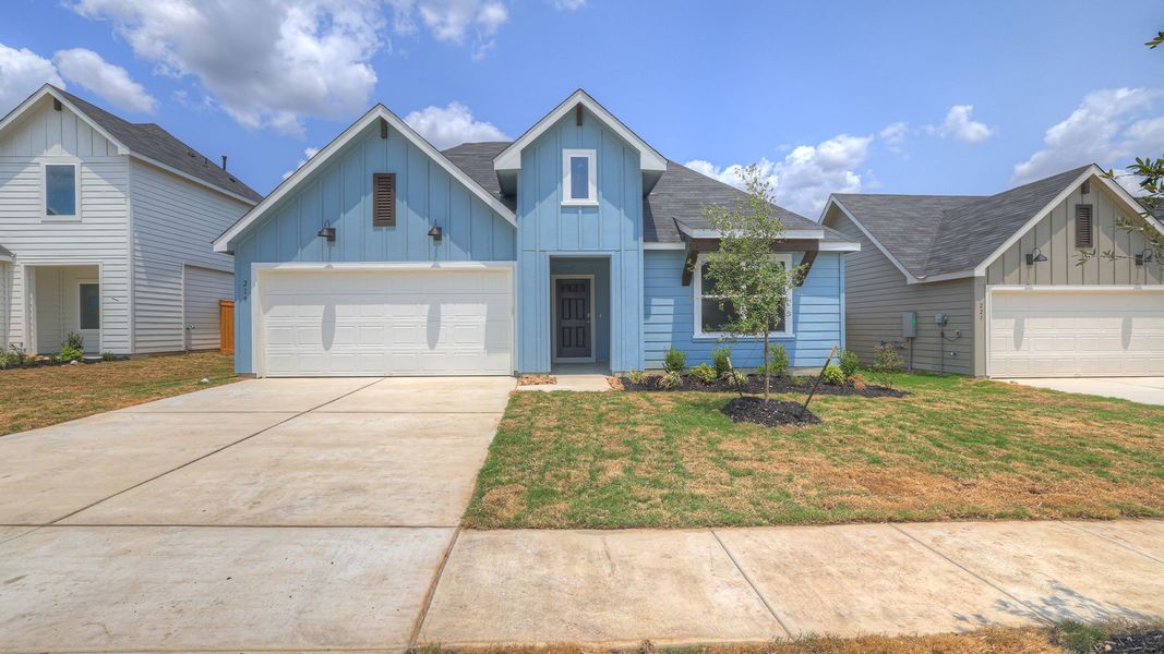 Front exterior of a new home in Trace, San Marcos, TX, highlighting curb appeal (Image 2).