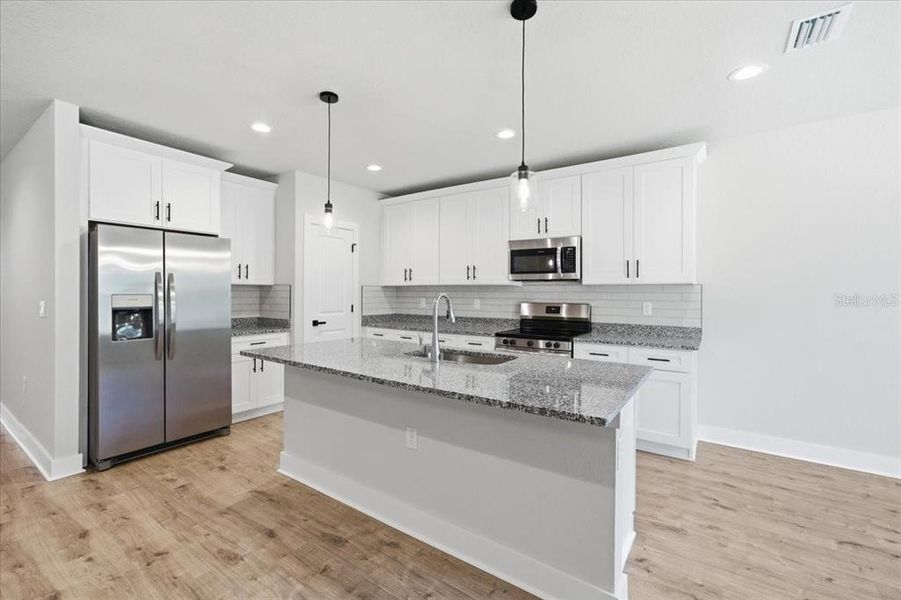 Furnished interior view inside a new home in , Weeki Wachee (Image 5).