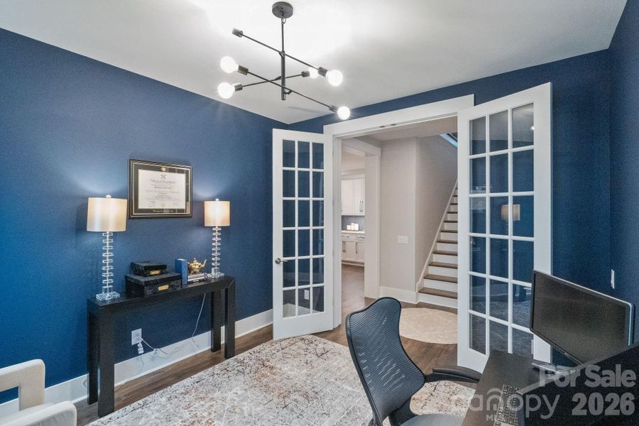 Home office with french doors on main level