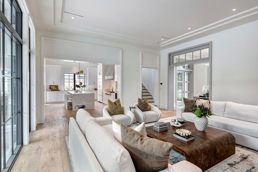 Amazing natural light in this home.   Transom windows flow light from entry to living room and define the spaces.