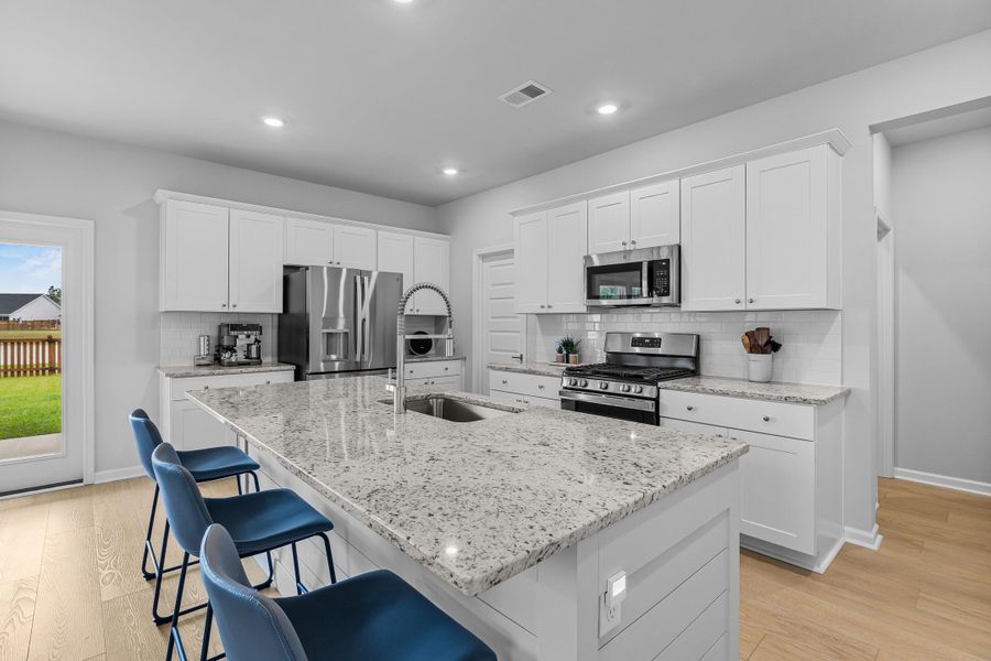 Furnished interior view inside a new home in Heron's Walk at Summers Corner, Summerville (Image 11).