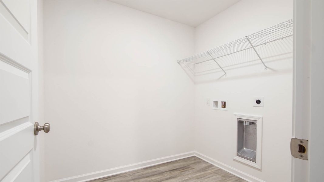 Image 32 representing the Robie by D.R. Horton in Riverwalk, Freeport, FL.