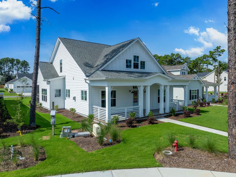 Front exterior of a new home in Osprey Landing, Southport, NC, highlighting curb appeal (Image 2).