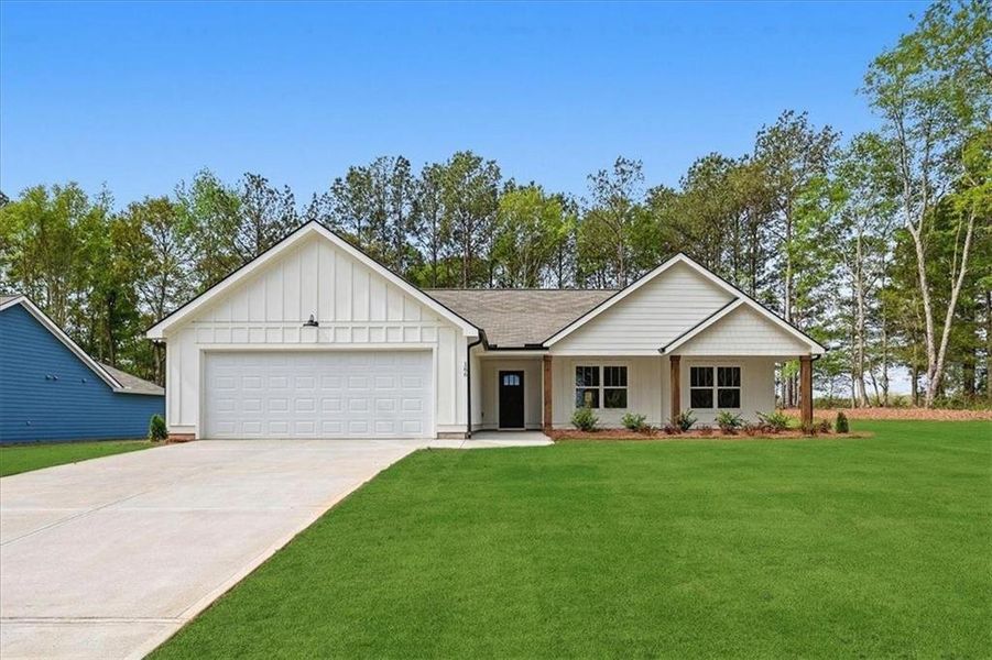Front exterior of a new home in , Hartwell, GA, highlighting curb appeal (Image 24).