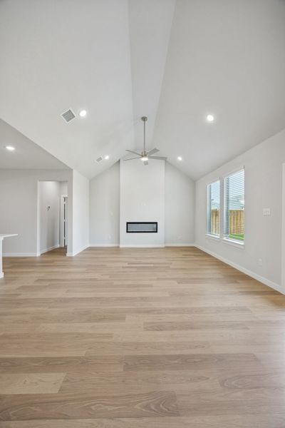 Living Room in the Masters home plan by Trophy Signature Homes – REPRESENTATIVE PHOTO