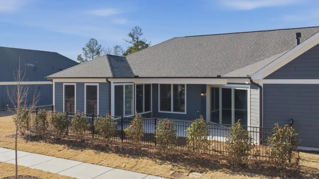 Exterior details and patio area of a home in The Courtyards at Oak Grove, Durham (Image 3).