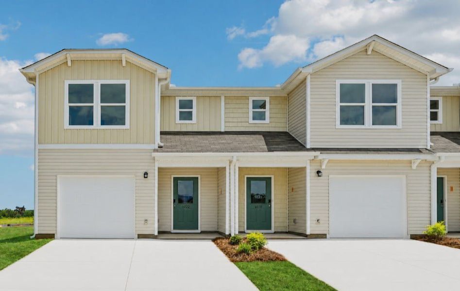Front exterior of a new home in Ellison Townhomes, Spartanburg, SC, highlighting curb appeal (Image 1). Front exterior of a new home in Ellison Townhomes, Spartanburg, SC, highlighting curb appeal (Image 1).
