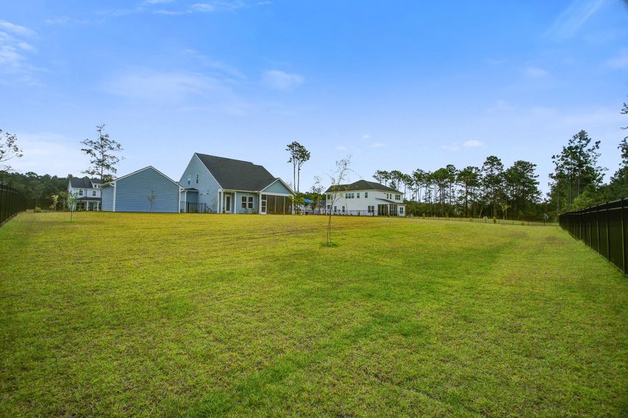Exterior details and patio area of a home in Pamlico Terrace, Awendaw (Image 26).