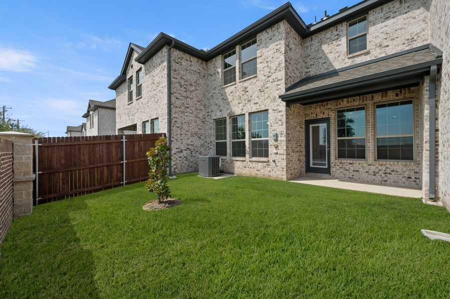 Front exterior of a new home in Main Street Village, Mansfield, TX, highlighting curb appeal (Image 27).