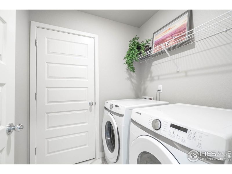 Furnished interior view inside a new home in Union Colony West, Evans (Image 27).