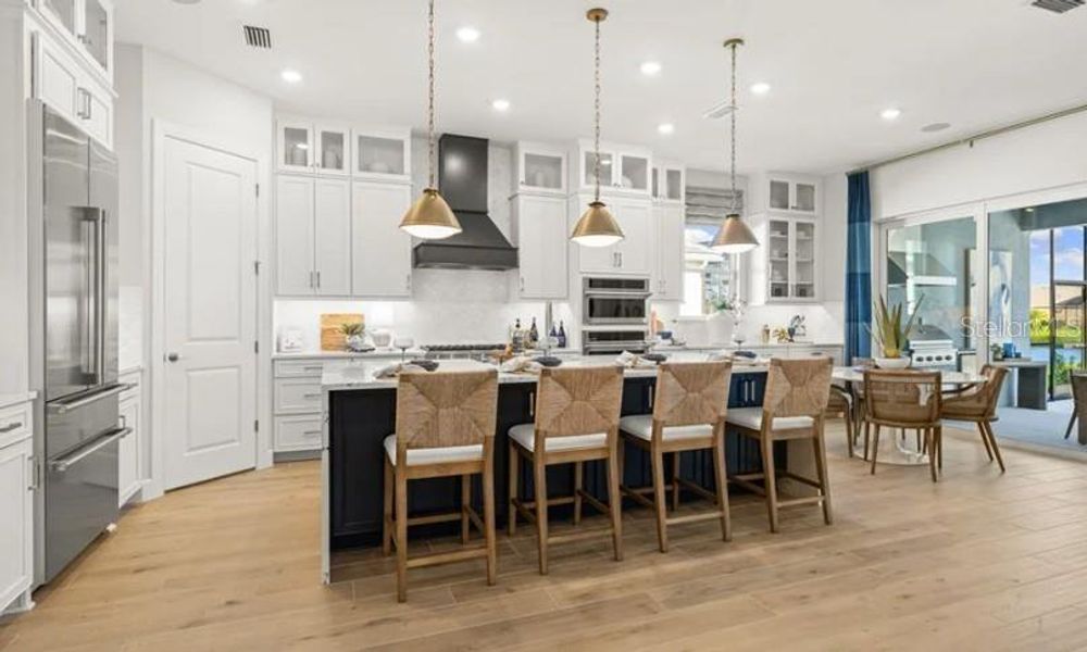 Furnished interior view inside a new home in Coasterra Community Group Page, Palmetto (Image 8).