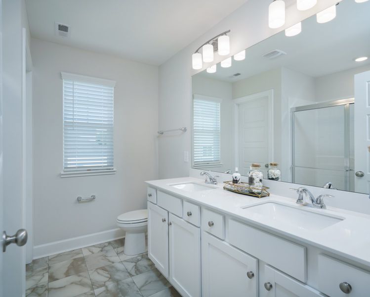 Representative furnished interior of a home built from the The Kennedy by Cothran Homes in Holly Ridge, Greenville (Image 19).