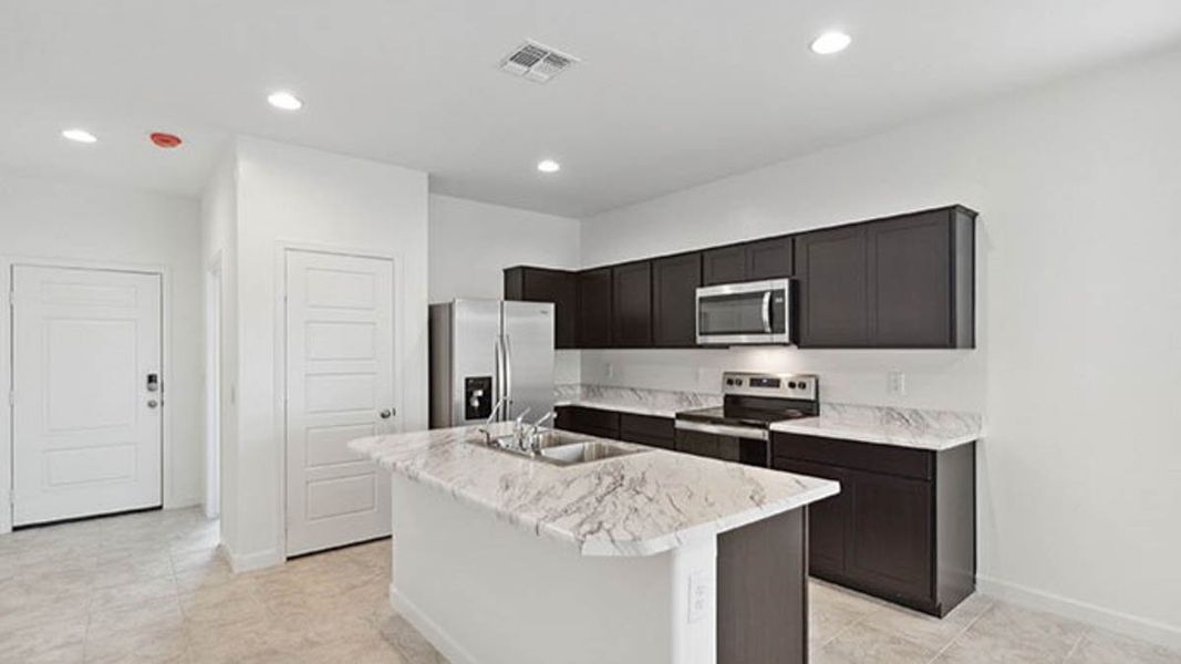 Representative furnished interior of a home built from the Abbot by D.R. Horton in Anthem at Merrill Ranch, Florence (Image 7).