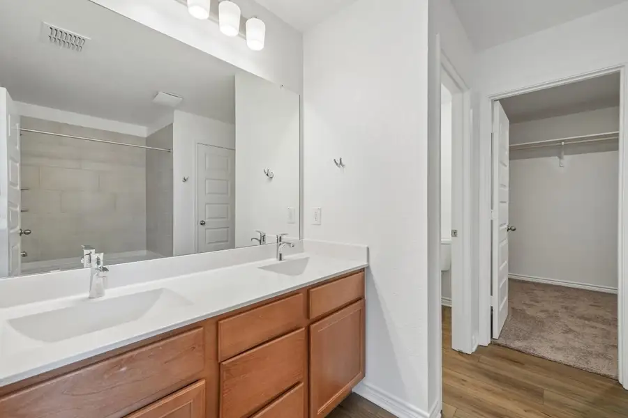 Furnished interior view inside a new home in Preserve at Culebra - Sterling Collection, San Antonio (Image 12).