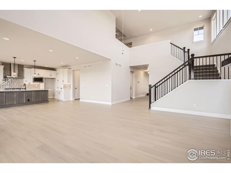 Spacious, unfurnished interior of a new home in RainDance National 60/70, Windsor (Image 15).