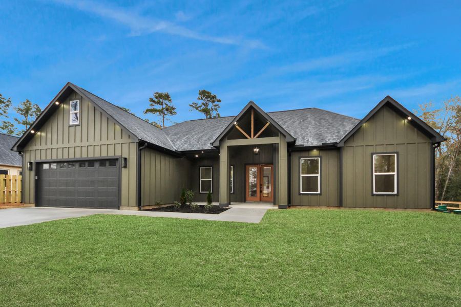 Front exterior of a new home in , Plantersville, TX, highlighting curb appeal (Image 26).