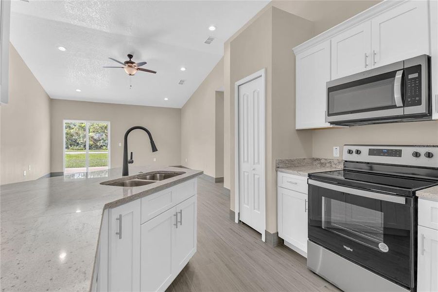 Furnished interior view inside a new home in , Kissimmee (Image 6).