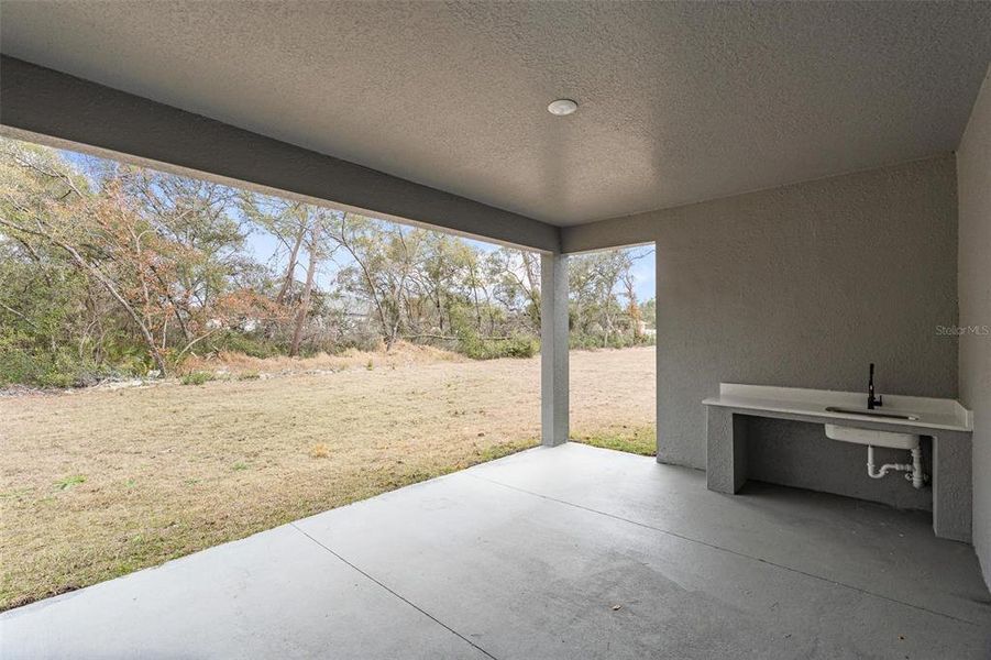 Exterior details and patio area of a home in , Ocala (Image 4).