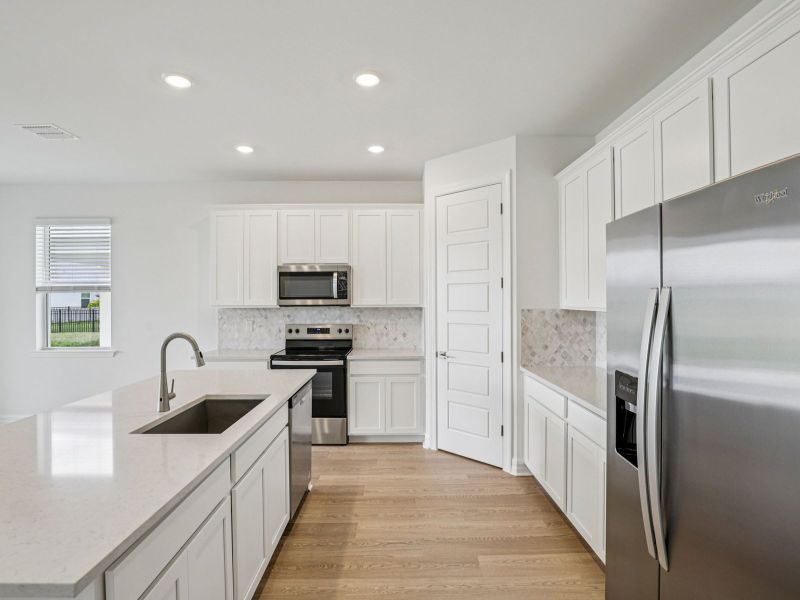 Furnished interior view inside a new home in Crescent Lakes - Reserve Series, Punta Gorda (Image 6).