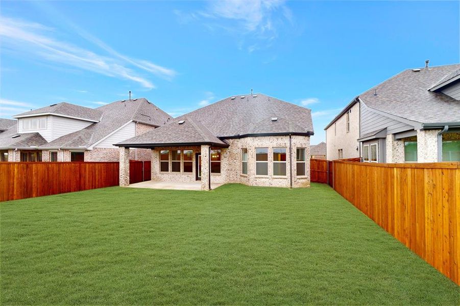 Front exterior of a new home in Lilybrooke at Legacy Hills, Celina, TX, highlighting curb appeal (Image 24).